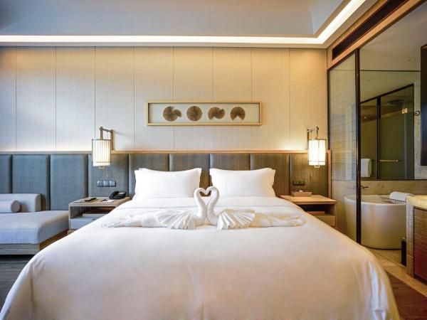 Harman Resort Hotel Sanya : photo 4 de la chambre chambre double ou lits jumeaux deluxe - vue sur mer