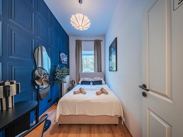 RIVÉ by Home1 : photo 3 de la chambre chambre lits jumeaux avec salle de bains commune