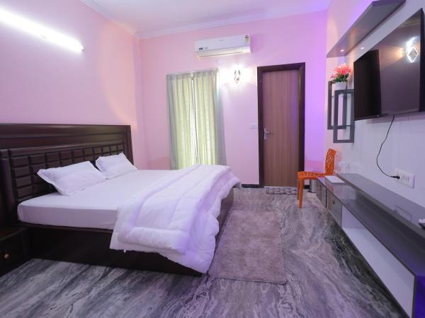 The Leela's Paradise : photo 1 de la chambre chambre double deluxe (2 adultes + 1 enfant)