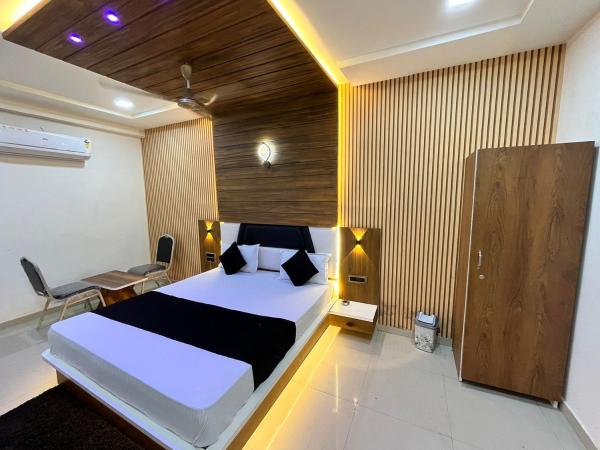 Hotel The Grand : photo 1 de la chambre suite junior