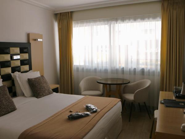 Hôtel Victoria : photo 2 de la chambre chambre double confort - vue sur ville