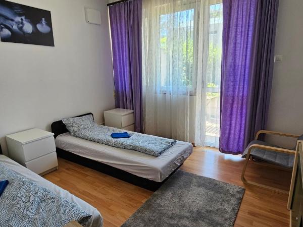 Mikes House 53 : photo 1 de la chambre chambre lits jumeaux avec balcon