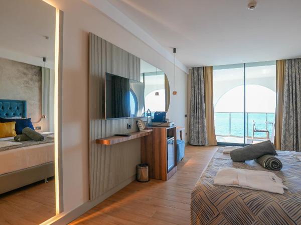 Ada Port Hotel Adults Only : photo 4 de la chambre chambre deluxe