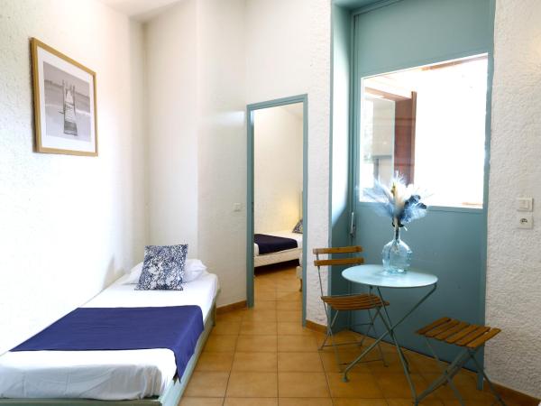 Village Vacances de Ramatuelle - Les sentier des pins : photo 2 de la chambre chambre triple