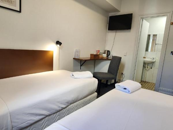 Newtown Cozy Stays : photo 2 de la chambre chambre lits jumeaux avec salle de bains