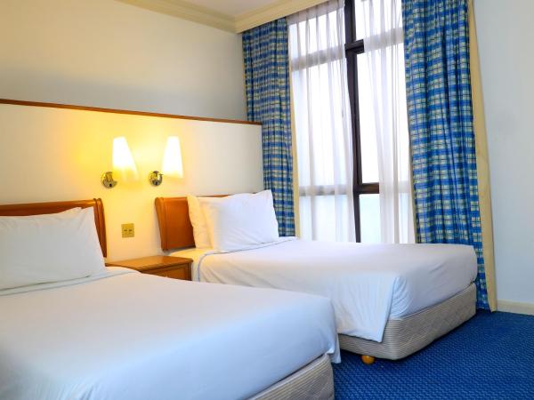 Merdeka Palace Hotel & Suites : photo 2 de la chambre suite 2 chambres