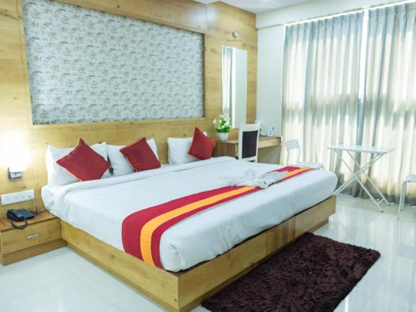 Ishwerya Suites : photo 3 de la chambre suite lit queen-size