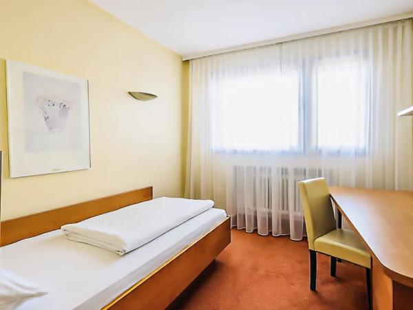 PLAZA INN Rieker Stuttgart Hauptbahnhof : photo 4 de la chambre chambre simple standard