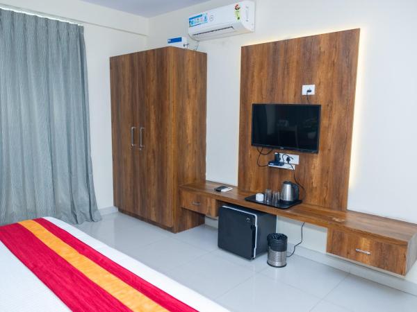Ishwerya Suites : photo 6 de la chambre chambre lit king-size deluxe