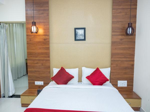 Ishwerya Suites : photo 3 de la chambre chambre lit king-size deluxe