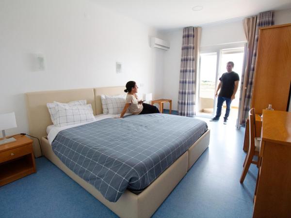 WOT Peniche PinhalMar : photo 8 de la chambre chambre double ou lits jumeaux - vue sur mer