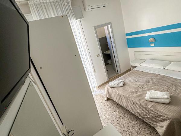 Hotel Serafini : photo 9 de la chambre chambre quadruple