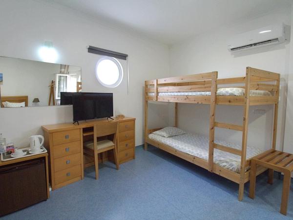 WOT Peniche PinhalMar : photo 3 de la chambre chambre familiale