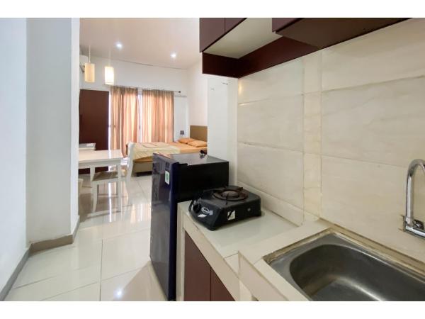 Curves Residence Mitra RedDoorz : photo 4 de la chambre chambre double standard