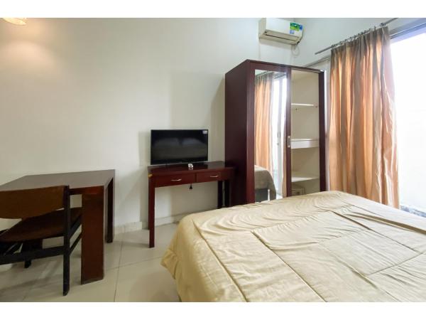 Curves Residence Mitra RedDoorz : photo 3 de la chambre chambre double standard