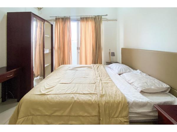 Curves Residence Mitra RedDoorz : photo 2 de la chambre chambre double standard