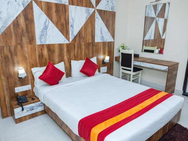 Ishwerya Suites : photo 4 de la chambre chambre double deluxe