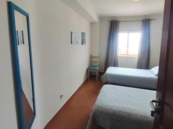 PKSC - Surfers Beach House : photo 6 de la chambre chambre lits jumeaux avec salle de bains commune