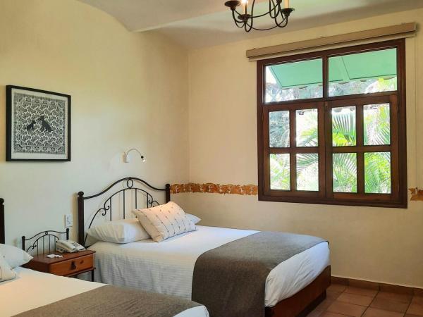 Casa los Cantaros Hotel Boutique : photo 1 de la chambre chambre lits jumeaux