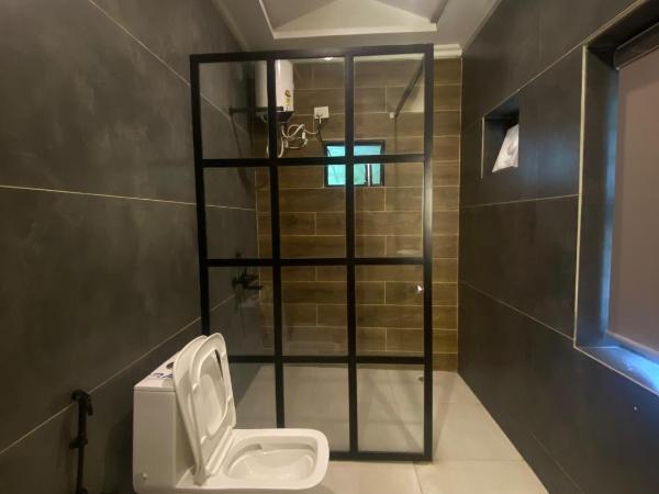 Button Eyes Resort - Pet friendly : photo 2 de la chambre chambre lit king-size - vue sur jardin