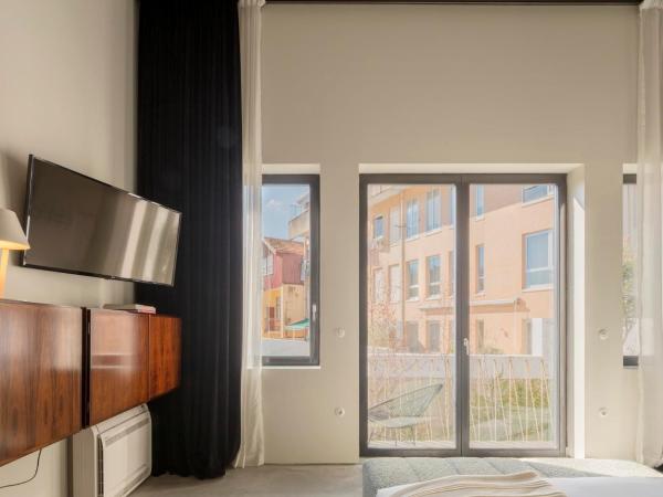 Hotel Tipografia do Conto by Casa do Conto : photo 3 de la chambre chambre double ou lits jumeaux de luxe avec balcon et vue sur le jardin