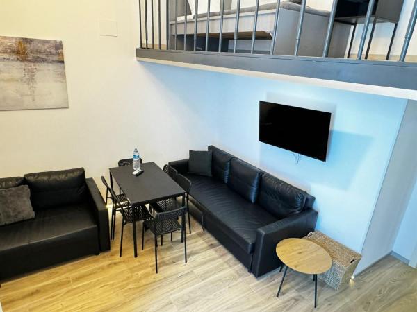 Melia y Fuster 23C : photo 2 de la chambre appartement en duplex