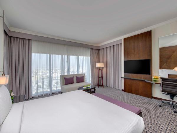 Media Rotana Dubai : photo 2 de la chambre chambre - lit king-size