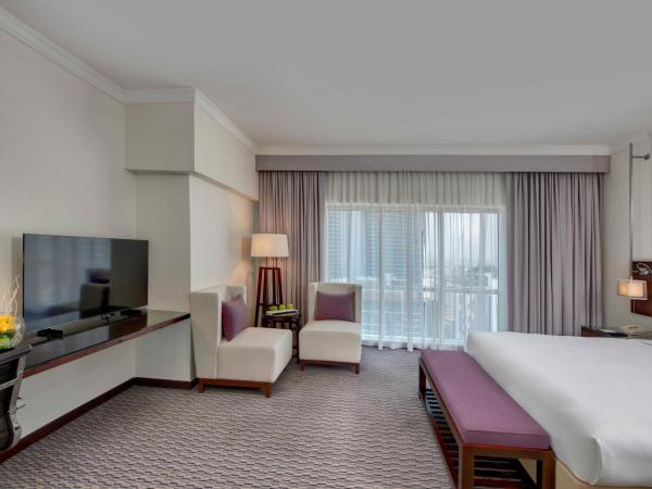 Media Rotana Dubai : photo 5 de la chambre chambre - lit king-size