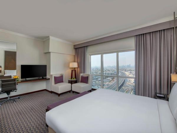 Media Rotana Dubai : photo 1 de la chambre chambre - lit king-size