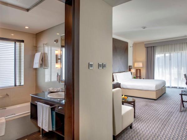 Media Rotana Dubai : photo 9 de la chambre chambre lit king-size spacieuse