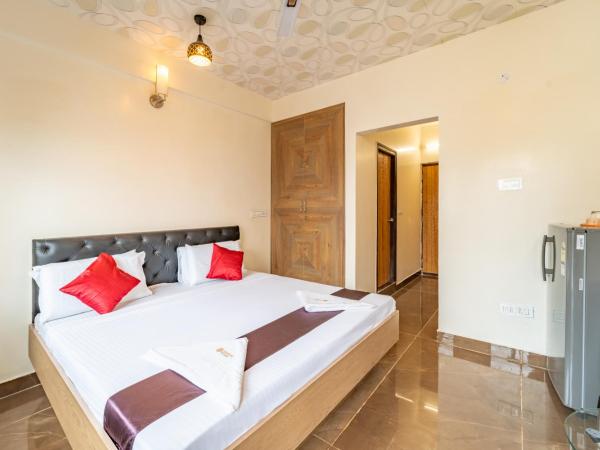 The Suites : photo 1 de la chambre chambre double ou lits jumeaux avec balcon