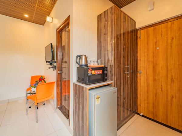 The Suites : photo 5 de la chambre chambre triple avec balcon