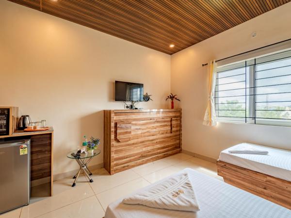 The Suites : photo 2 de la chambre chambre double ou lits jumeaux supérieure avec terrasse