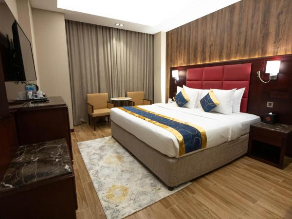 Ramee Guestline Hotel : photo 1 de la chambre chambre simple standard