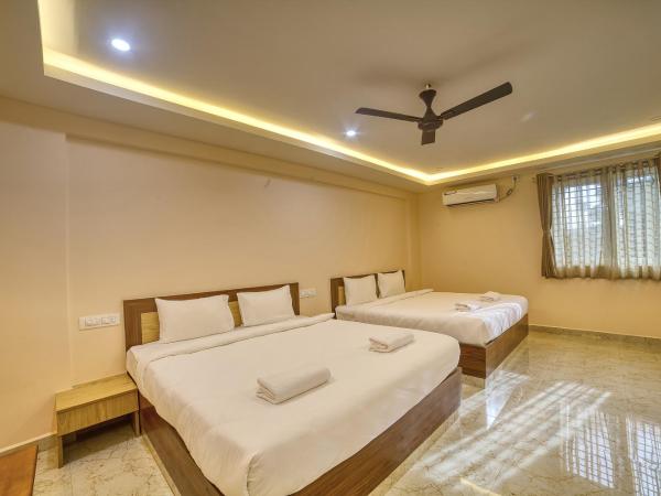 Stay On The Way Near Bangalore Airport : photo 1 de la chambre chambre 2 lits king-size