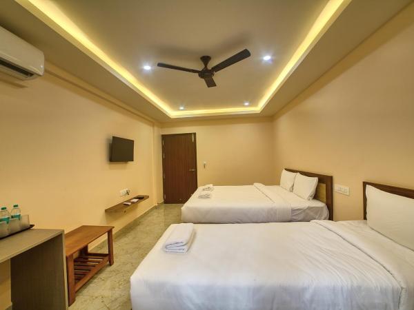 Stay On The Way Near Bangalore Airport : photo 1 de la chambre chambre triple standard
