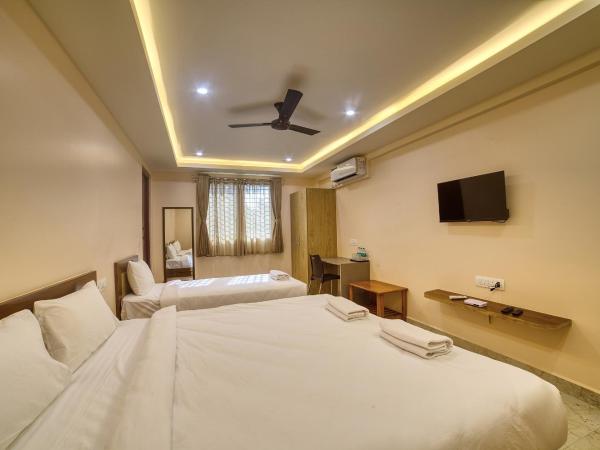 Stay On The Way Near Bangalore Airport : photo 10 de la chambre chambre triple standard