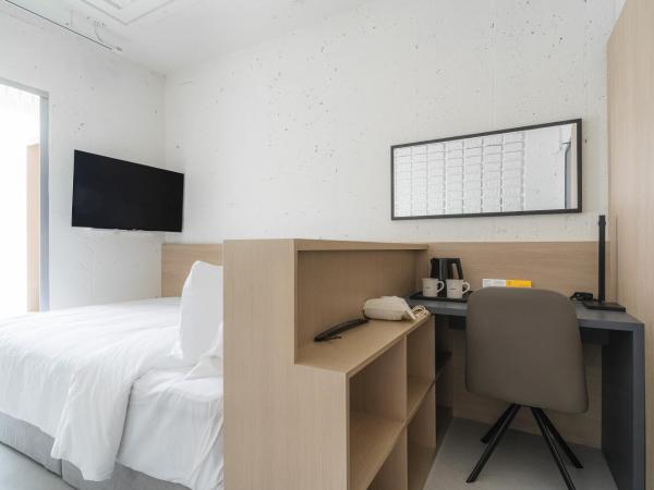 Homes Stay G-Valley Gasan : photo 1 de la chambre chambre double standard