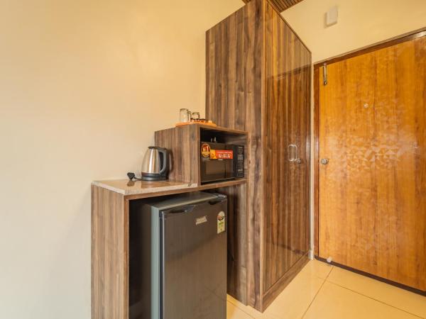 Seasons Suites Bommasandra : photo 6 de la chambre chambre triple avec terrasse