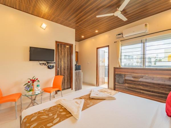 Seasons Suites Bommasandra : photo 1 de la chambre studio avec balcon