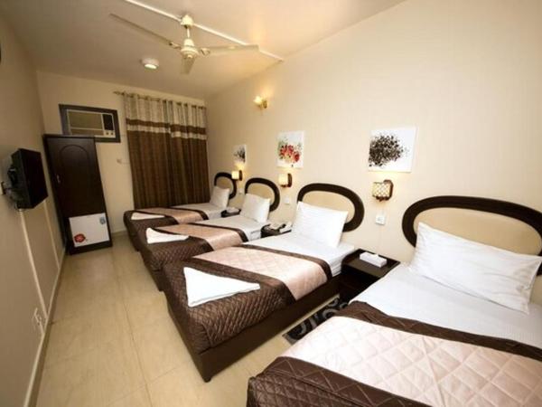 Grand Sina Hotel : photo 1 de la chambre chambre quadruple