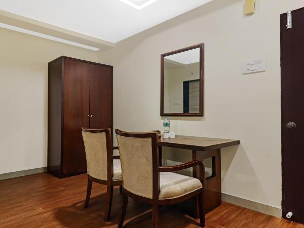 Hotel Midtown Begumpet : photo 3 de la chambre chambre double deluxe (2 adultes + 1 enfant)