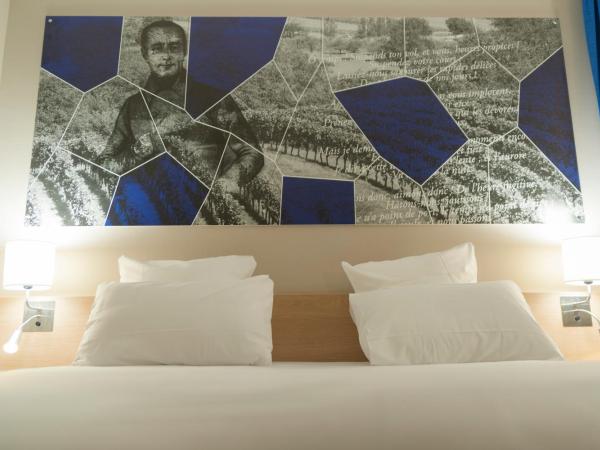 Brit Hotel Mâcon Centre Gare : photo 4 de la chambre chambre double cosy