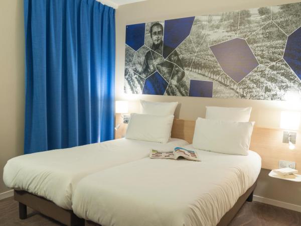 Brit Hotel Mâcon Centre Gare : photo 4 de la chambre chambre lits jumeaux cosy