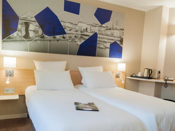 Brit Hotel Mâcon Centre Gare : photo 1 de la chambre chambre lits jumeaux premium
