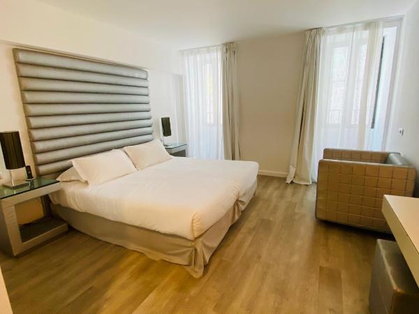 L'Escale Côté Sud : photo 5 de la chambre chambre privilège avec vue sur la ville