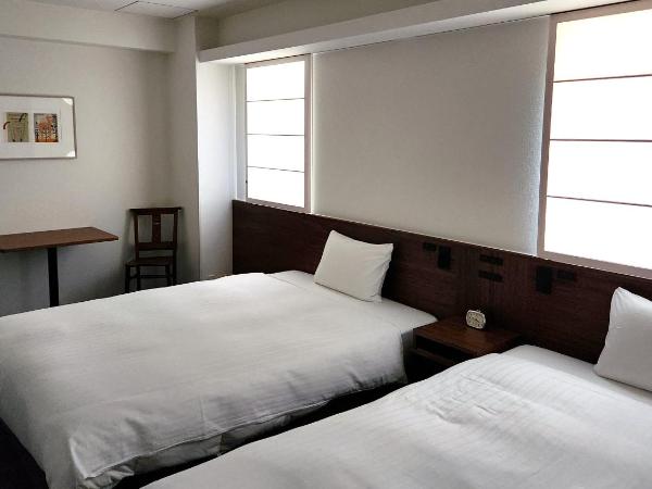 Shin-Osaka Station Hotel : photo 1 de la chambre chambre lits jumeaux deluxe