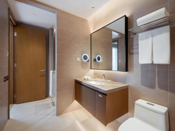Dongguan Forum Hotel and Apartment - Former Pullman hotel Dongguan Forum : photo 5 de la chambre two bedroom and living room apartment