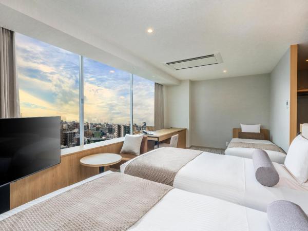 ART HOTEL Nippori Lungwood : photo 1 de la chambre 【new】twin room with extra bed and sky view - non-smoking