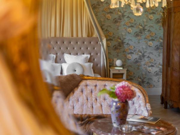 Castel Bois Marie, Maison d'hôtes : photo 8 de la chambre suite supérieure avec terrasse - vue sur lac